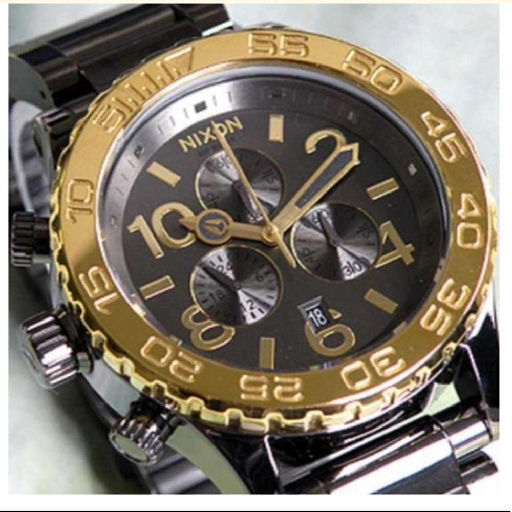 Nixon Men’s Black and Gold Chronograph Watch
